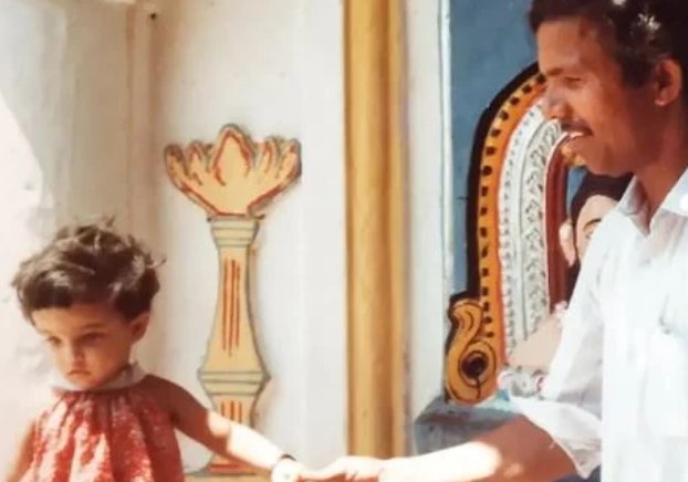 A childhood picture of Apurva Nemlekar with her father