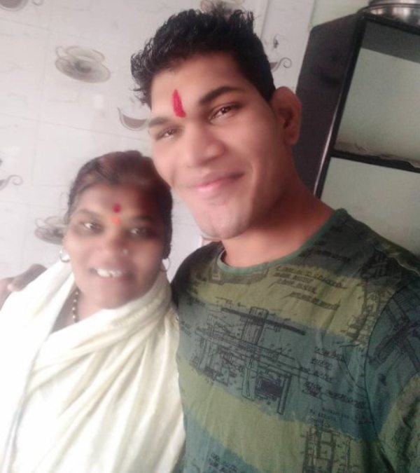 A photograph of Yogesh Jadhav with his mother Surekha