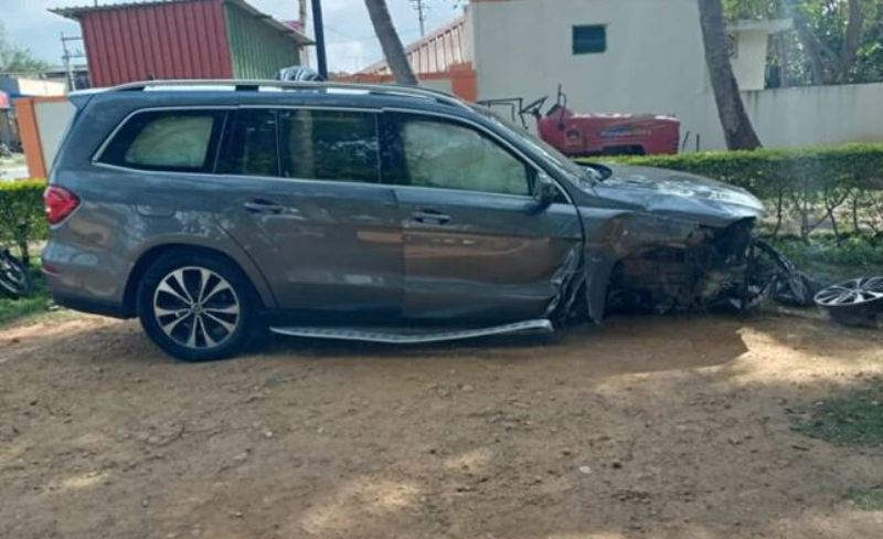 A picture of the damaged car in which Prahlad Modi and his family were travelling at the time of the accident
