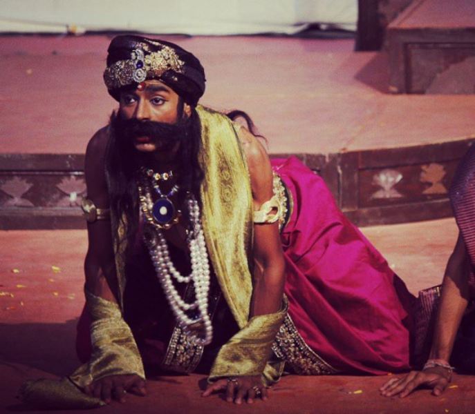 Aatm Prakash Mishra playing the role of a villian in one of the theatre plays