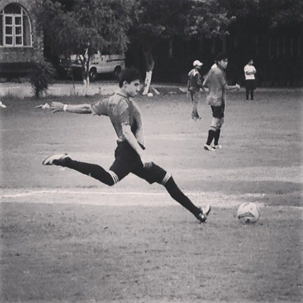 An old picture of Hamid Barkzi playing football