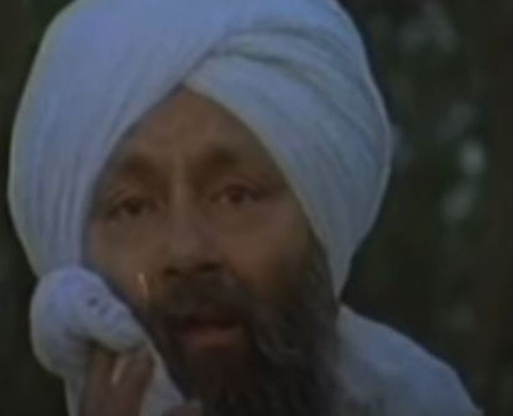 Arun Bali as Dharam Singh in a scene from the Punjabi film Baisakhi (1991)