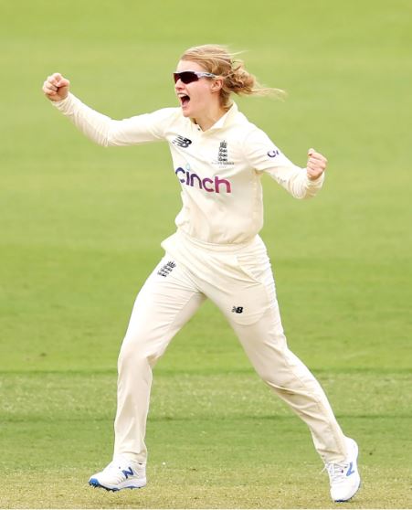 Charlie Dean celebrating her first Test wicket