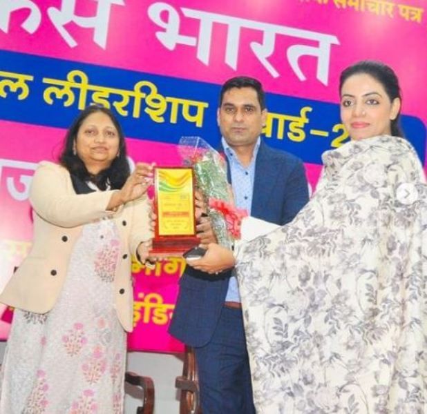 Divya Maderna with her Women Political Leadership Award by Focus India in New Delhi