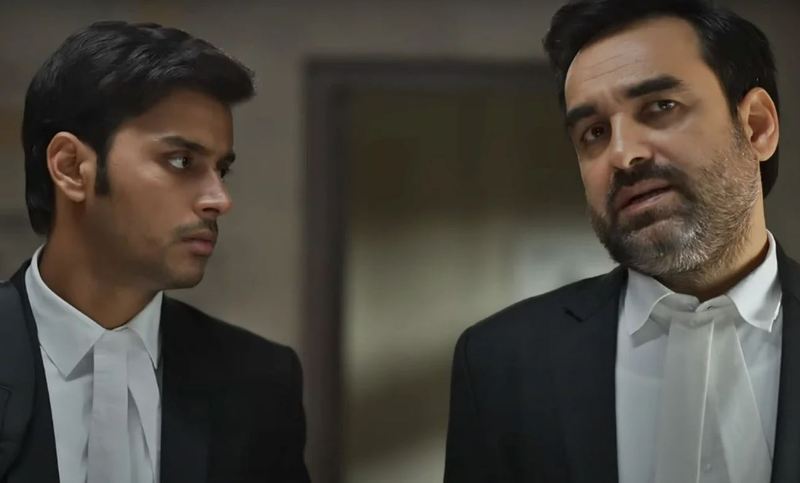 From left - Aatm Prakash Mishra (as Deep), along with co-star Pankaj Tripathi (as Madhav Mishra) in 'Criminal Justice - Adhura Sach' (2022)
