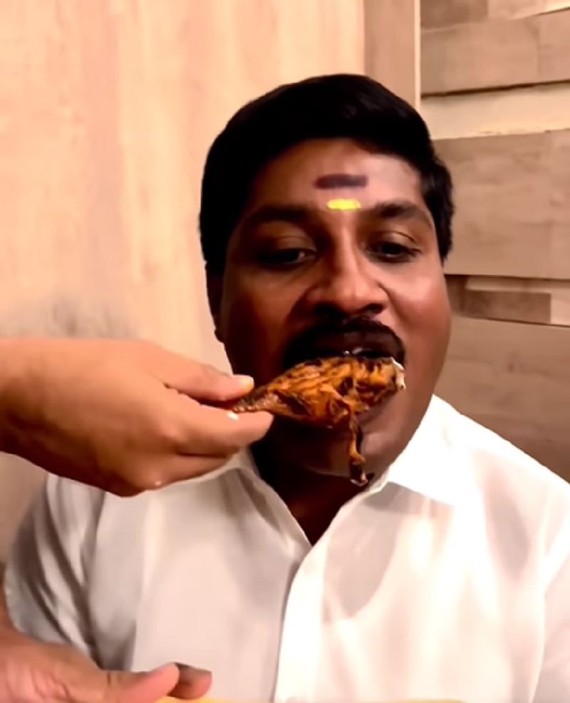 GP Muthu eating chicken