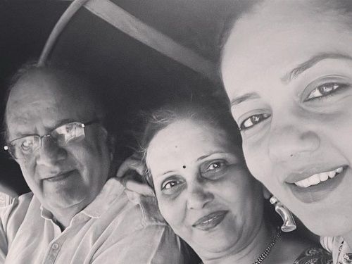 Neha Joshi with her parents