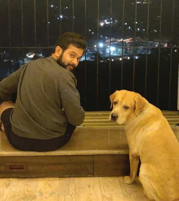 Nikhil Rajeshirke with his pet dog, Guru