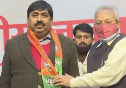 Promod Gupta (left) while joining BJP government in 2022
