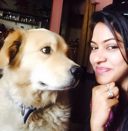 Rachitha Mahalakshmi with her pet dog