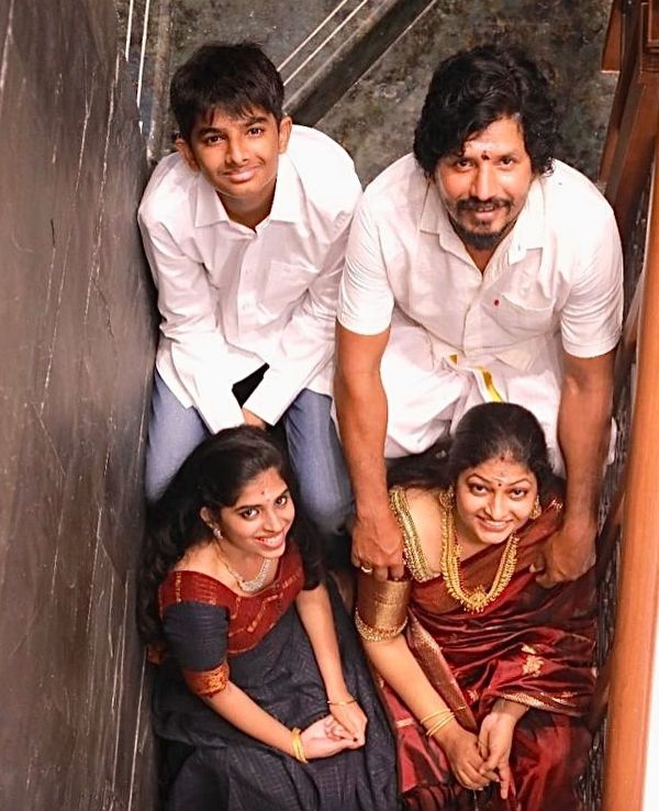 Ravi Varman with his wife and children