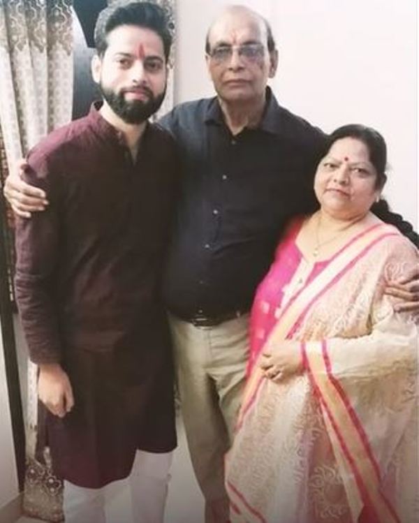 Rishab Karanwal with his parents