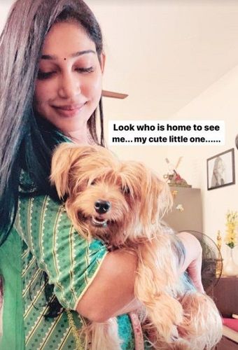 Sheriina Sam with her pet dog