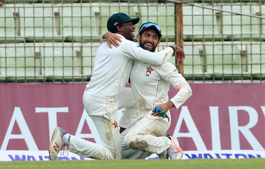 Sikandar Raza (right) playing Test cricket