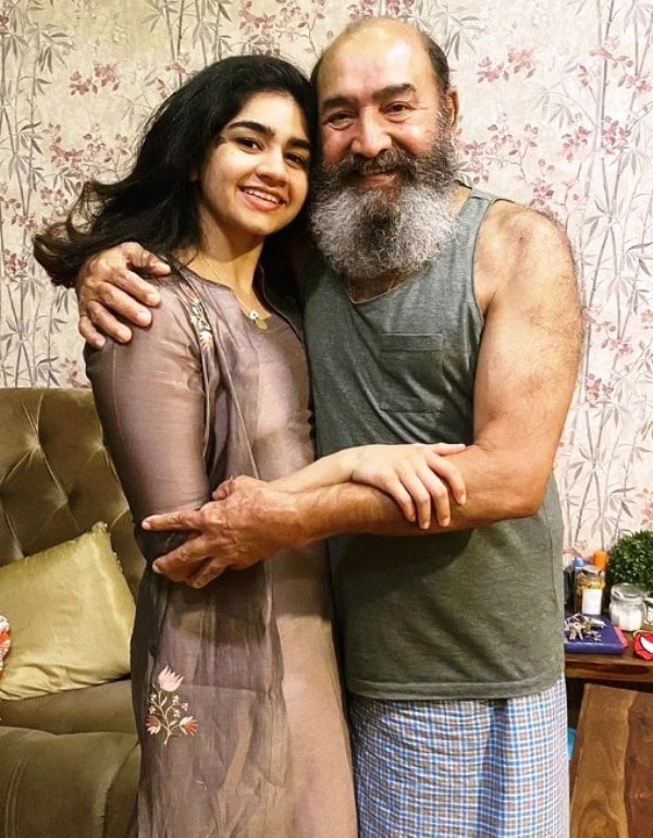 Vijayakumar with his granddaughter