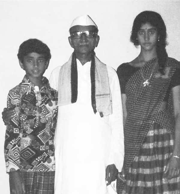 A childhood image of Jayadev Galla with his grandfather and his sister
