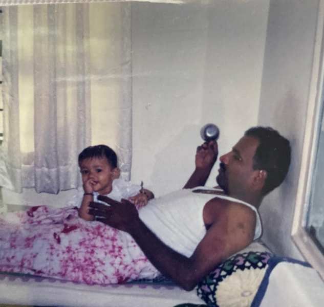 A childhood image of Sapthami Gowda with her father