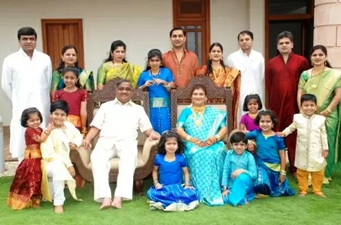 A family photograph of the Sankeshwar family
