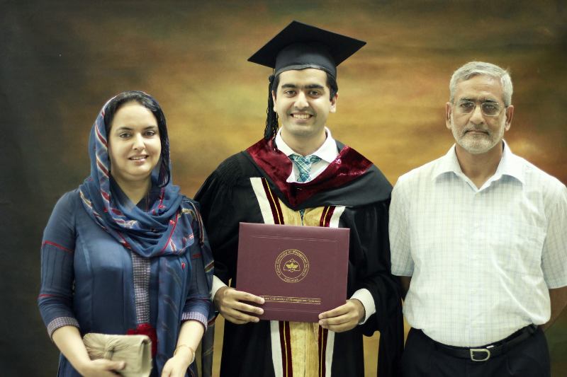 A photo of Saim Sadiq with his parents