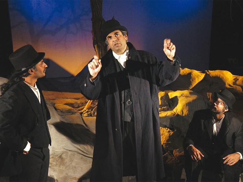 Ameed Raiz as Polo (centre),Faris Khalid as Estragon (left) and Ali Junejo as Vladimir (right) in a scene from Samuel Beckett's classic play directed by Napa's Zia Mohyeddin.