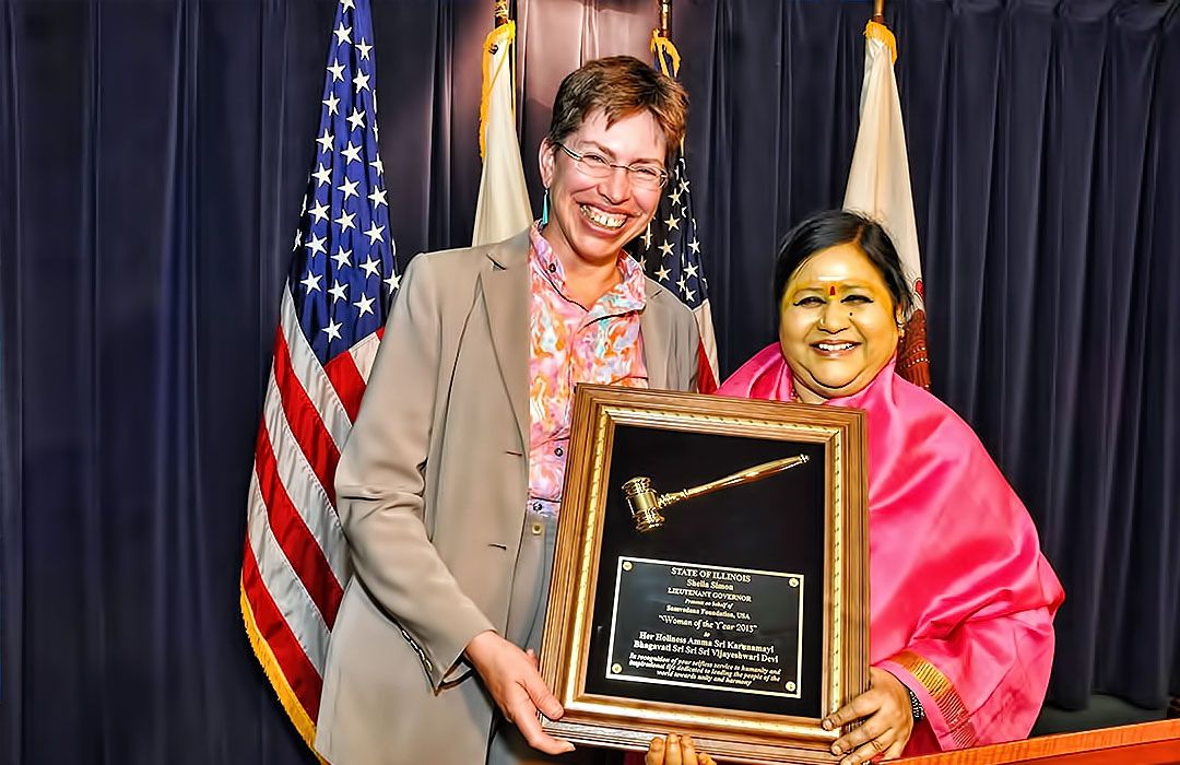 Amma Sri Karunamayi receiving the Women of the Year Award in 2013