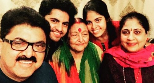 Ashok Pandit and his mother, wife and children