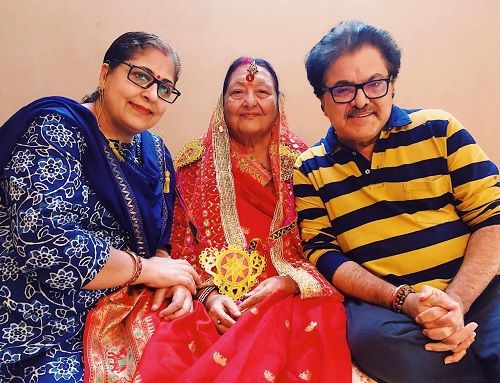 Ashok Pandit with his mother and wife