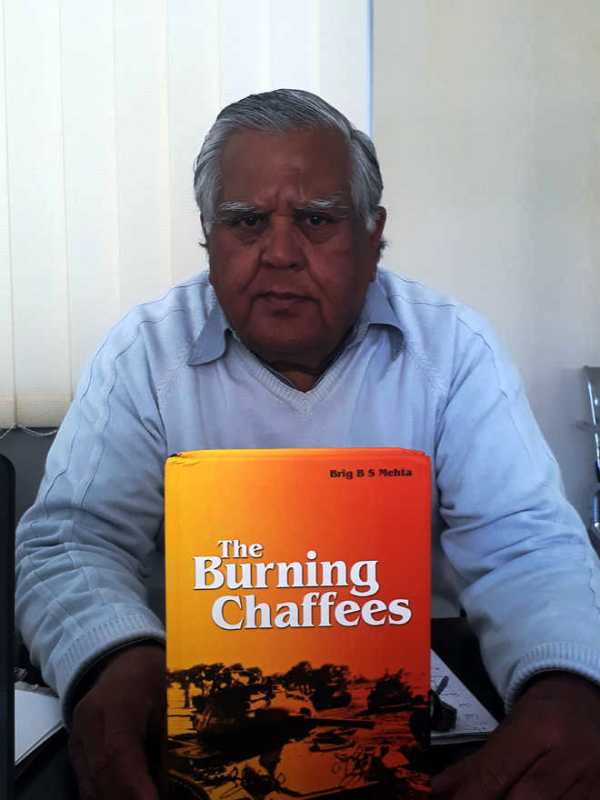 Balram Singh Mehta with his book