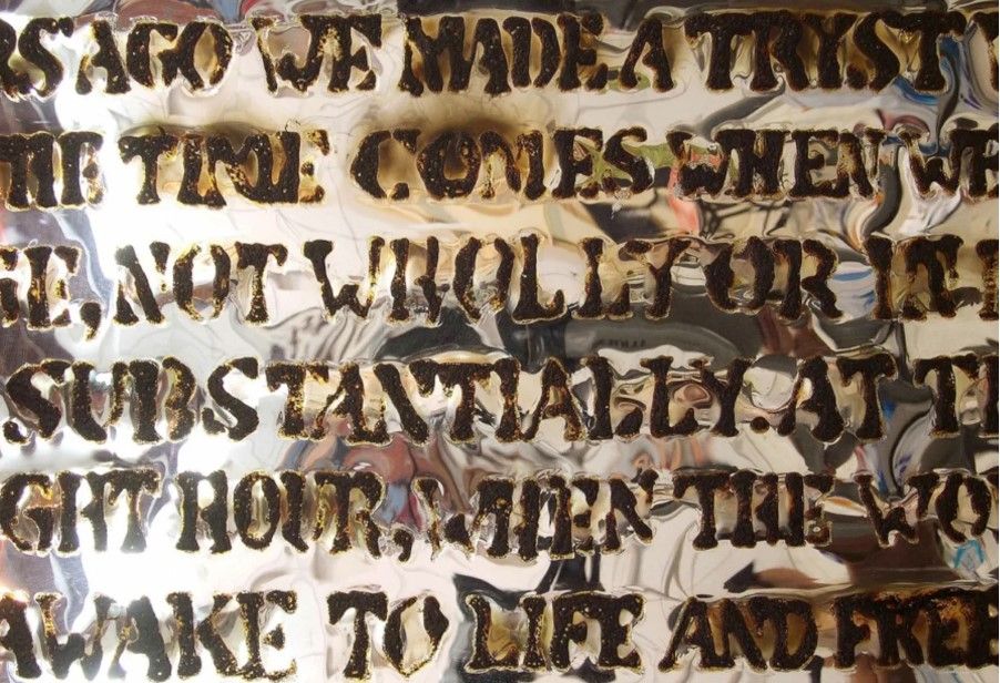 Burnt words in the installation 'Public Notice,' by Jitish Kallat