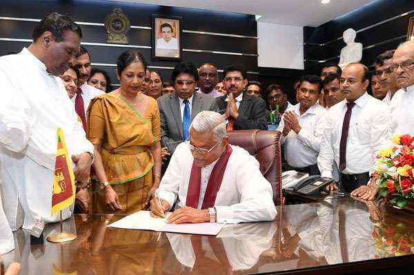 Chamal Rajapaksa assuming his duties as the Minister of Health, Nutrition, and Indigenous Medicine