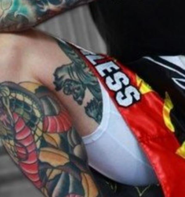 Jason David Frank's tattoo on left thigh