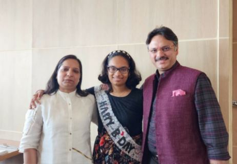 Laxmi Singh with her husband and daughter