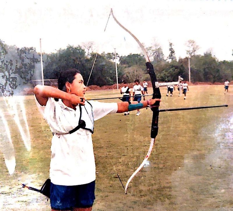 Lin Laishram as a young man practicing archery