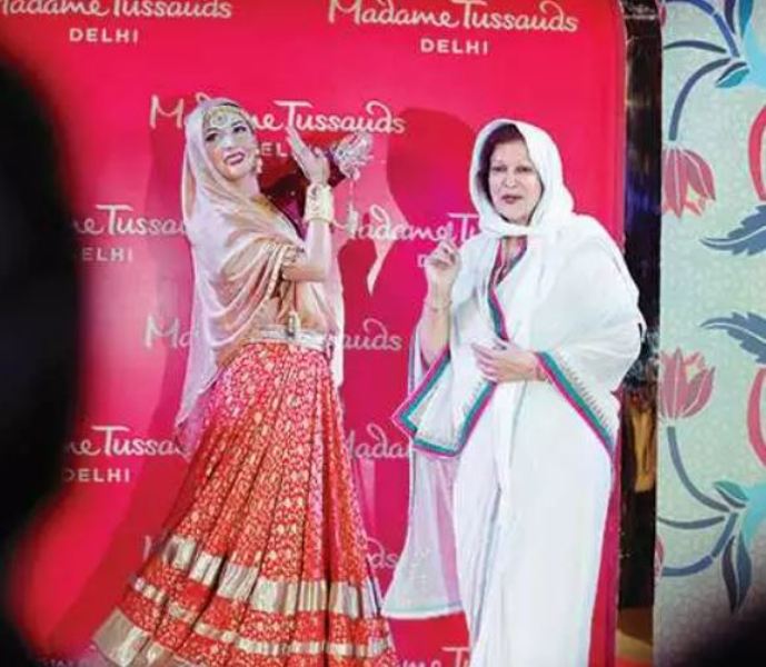 Madhur Bhushan at New Delhi centre of Madame Tussauds event, standing along with Madhubala's statue