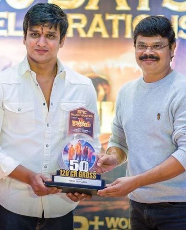 Nikhil Siddhartha posing with his 50 Days Shield Award for the film Karthikeya 2