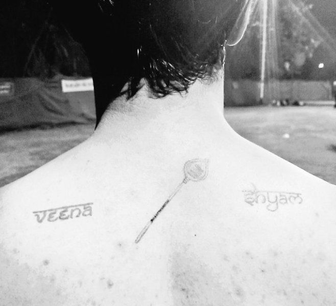 Nikhil Siddhartha's tattoo on his upper back, which denotes the name of his parents