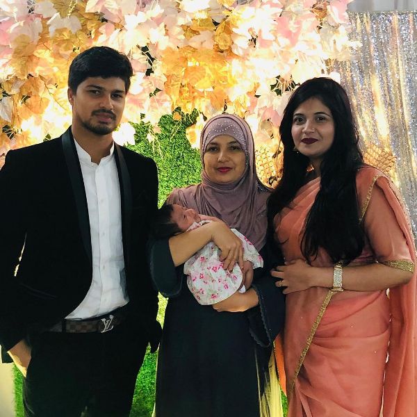 Nurul Hasan (left) with his mother (center), wife (right) and daughter