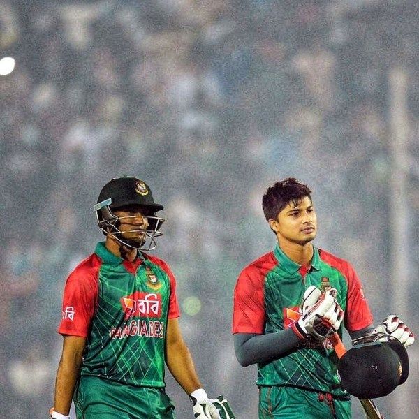 Nurul Hasan (right) during his debut T20I match
