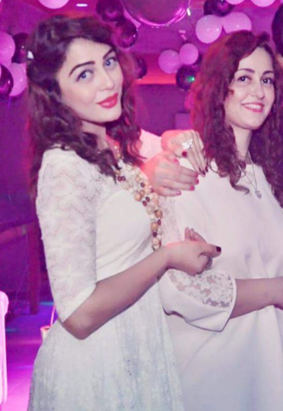 Saima Baloch, along with her sister, Meera Baloch (right)