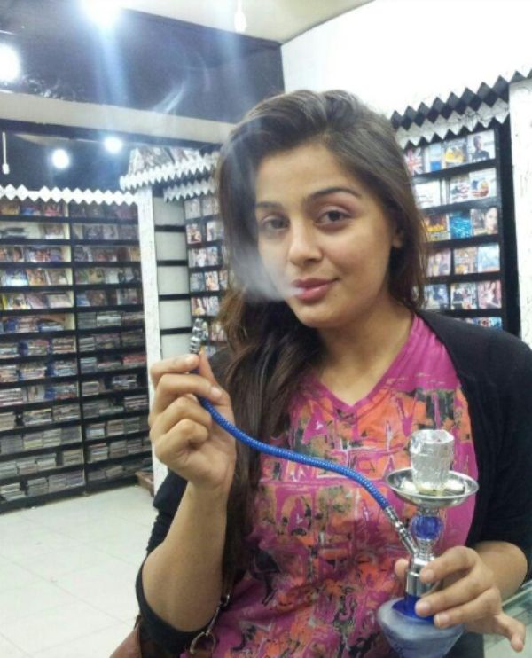 Saima Baloch smoking a hookah