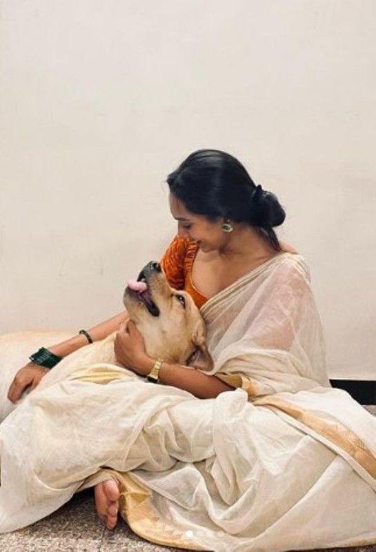 Sanchana Natarajan and her pet dog, Kuppus