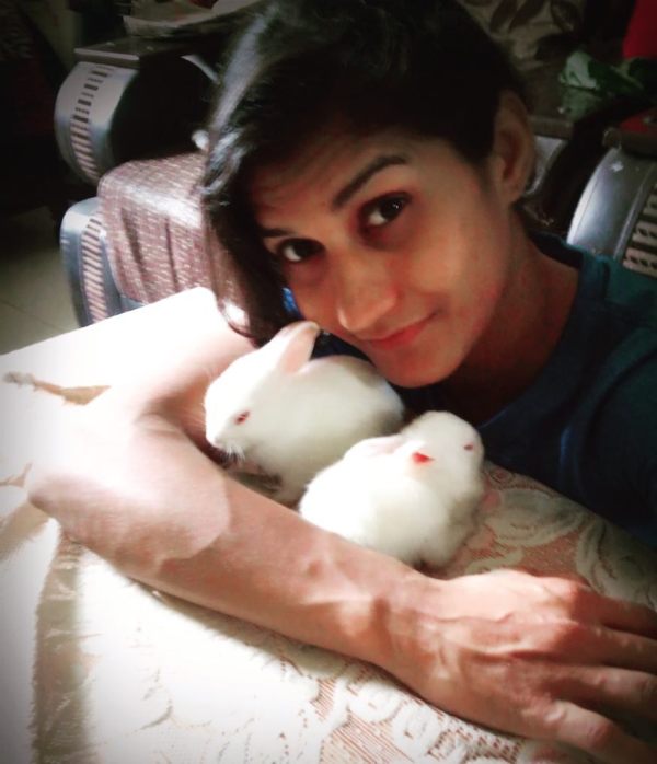 Suchika Tariyal playing with rabbits