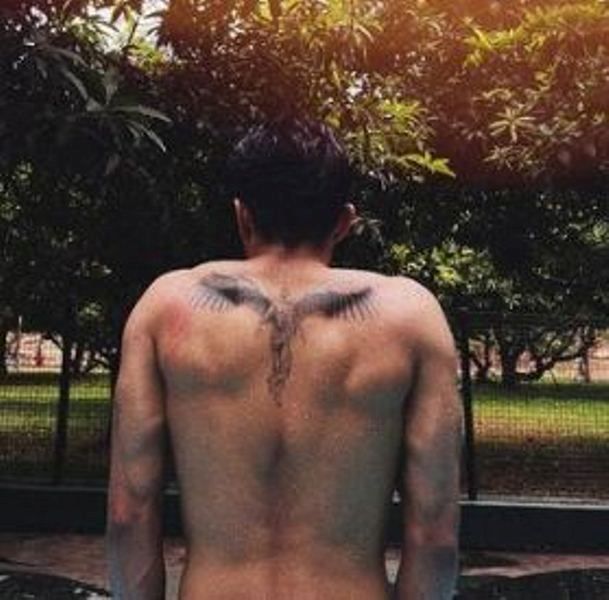 Anirudh's tattoo on his back