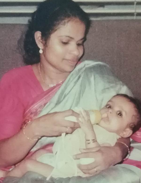A childhood picture of Hanna Reji Koshy with her mother