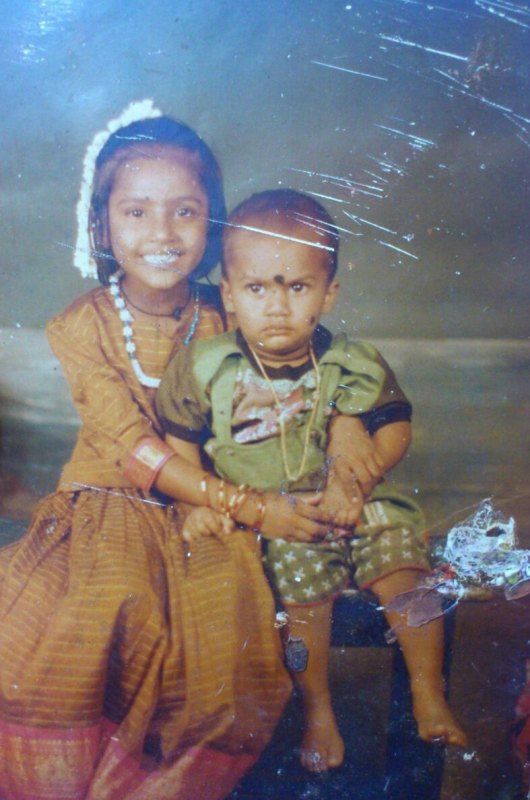 A childhood picture of Myna Nandhini and her brother