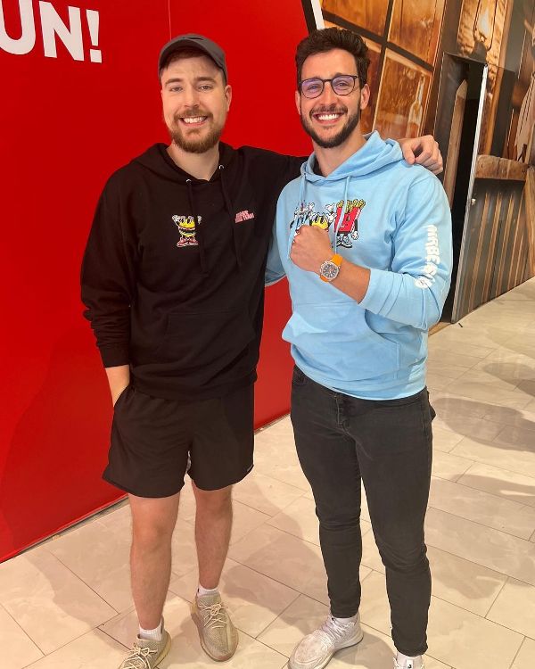 A photo of Dr Mike with Mr Beast