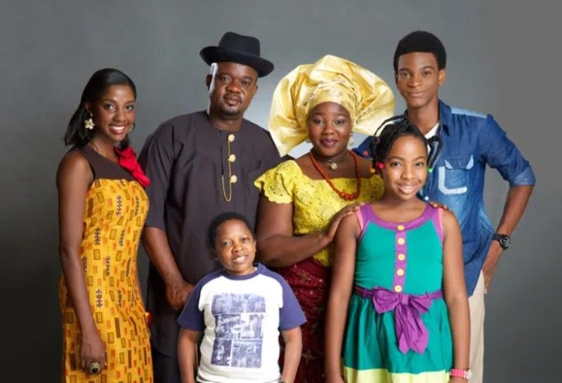 Ada Ameh (in yellow cap) with starcast of The Johnsons