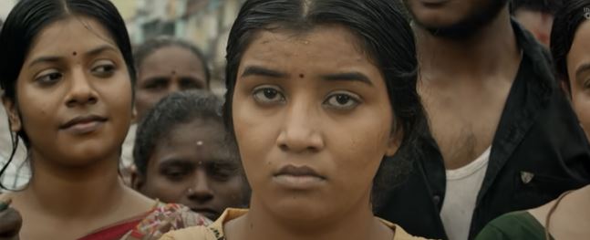 Dhanalakshmi in the music video of the Parai song