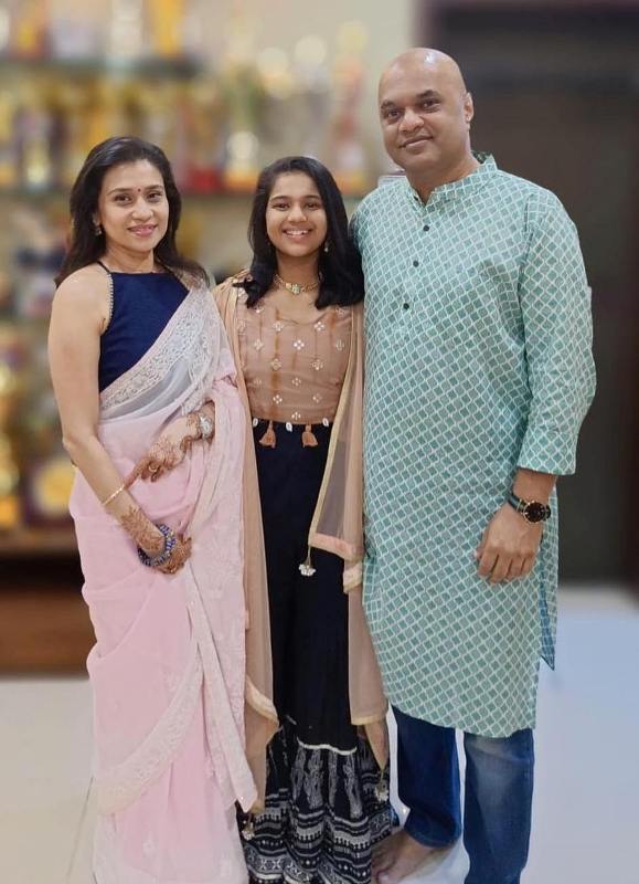 Diya Chitale with her father, Parag Chitale, and mother, Reshma Chitale