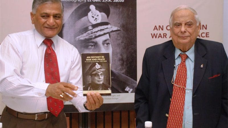 General V. K. Singh holding J. F. R. Jacob's book